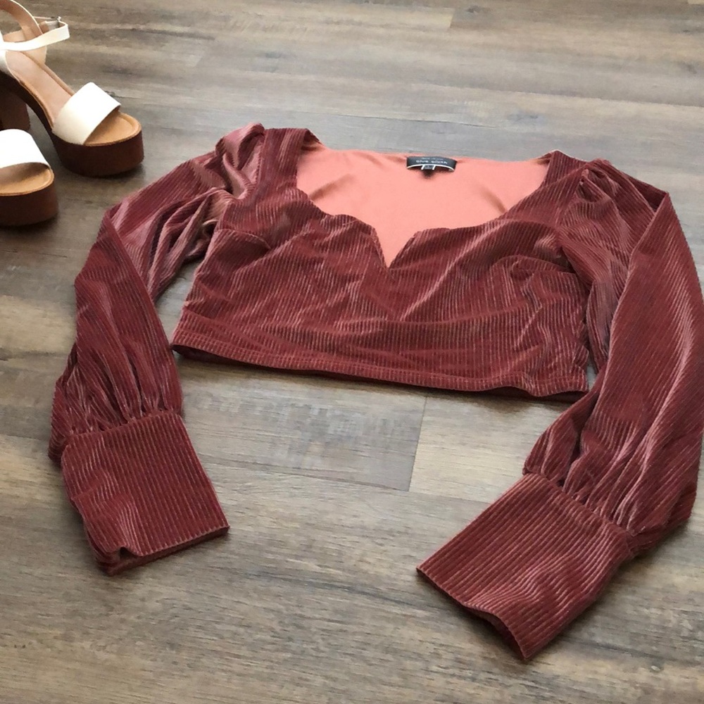 Color is a deep rose. Velvet, long sleeve, midi.